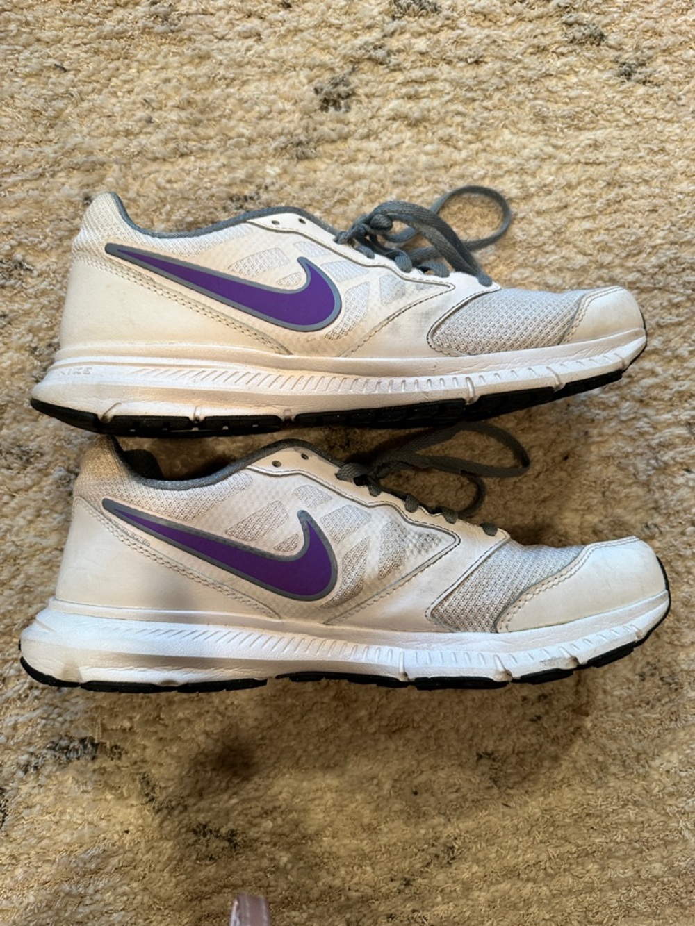 Nike White Athletic Sneakers with Purple Swoosh